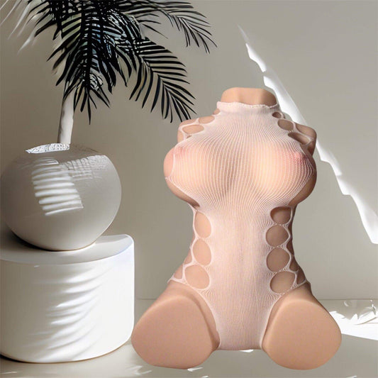 Stylish mannequin wearing a unique nude-toned outfit, displayed with a modern plant arrangement.