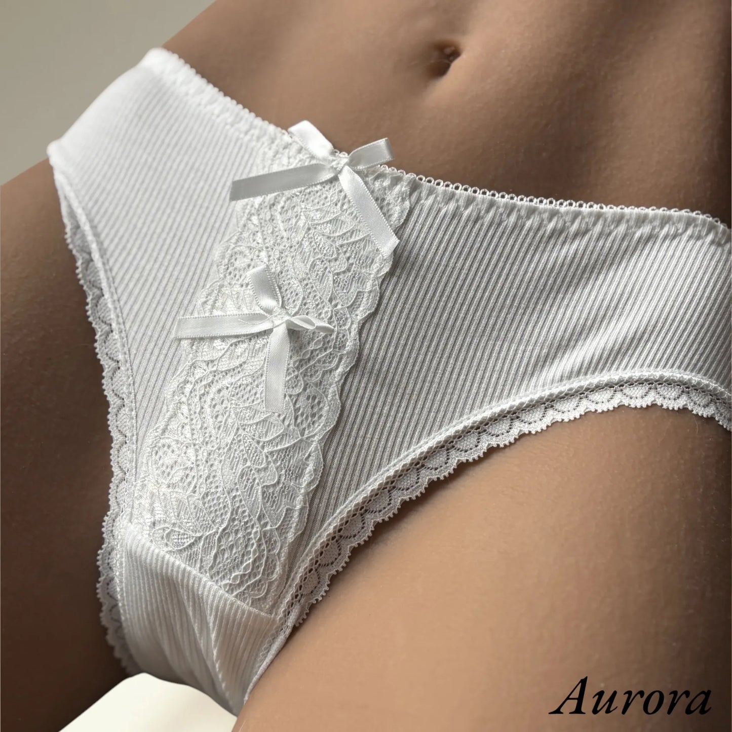 aurora wearing white lingerie ribbon panties detailled view