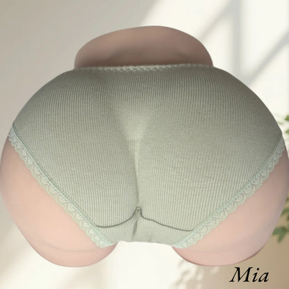 Mia wearing green lingerie ribbon panties back view
