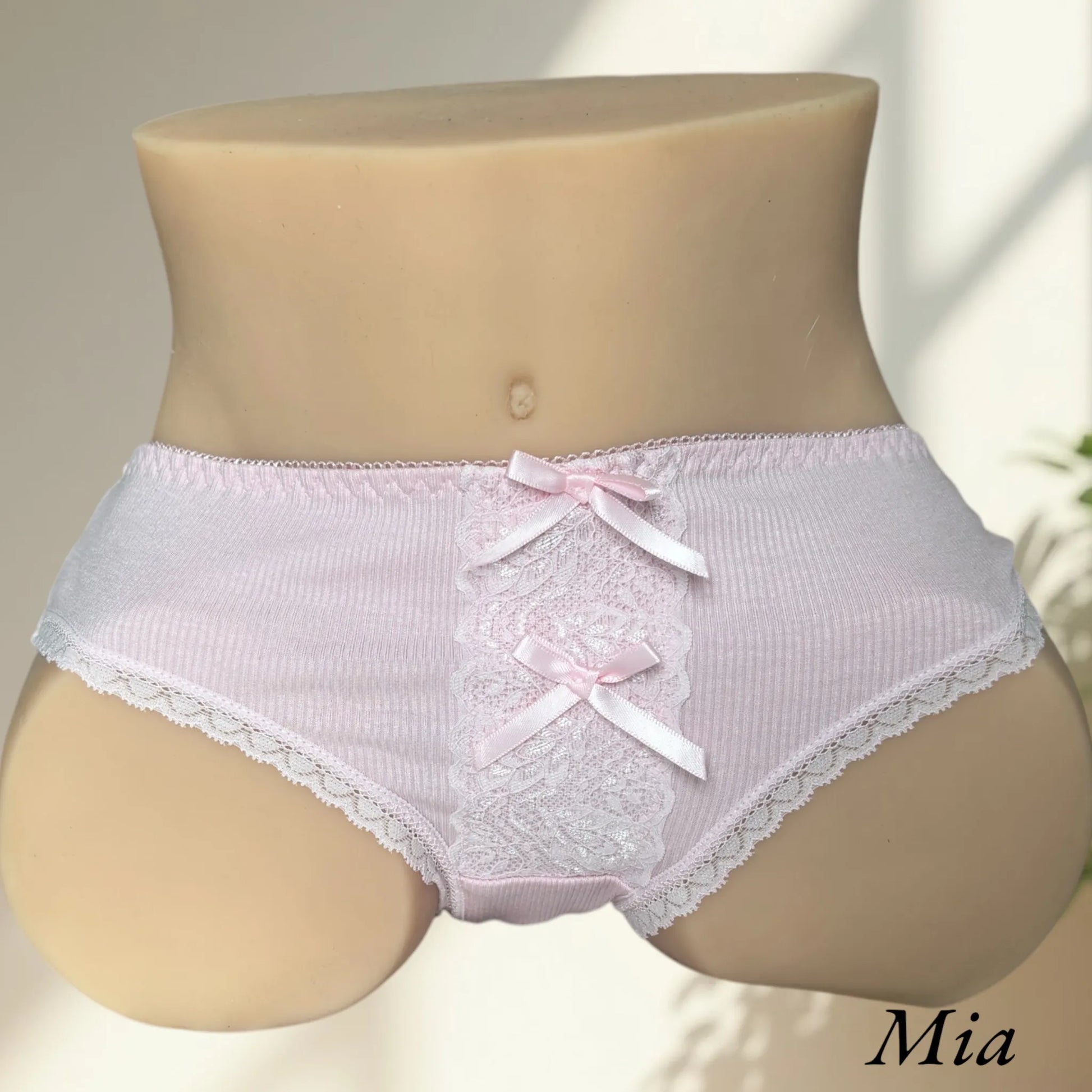 Mia wearing mauve lingerie ribbon panties front view