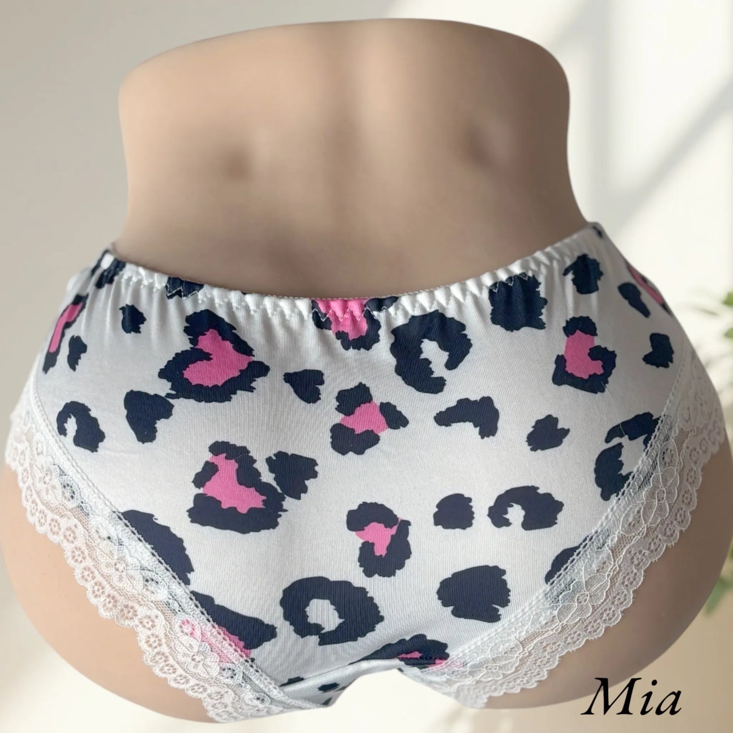 Mia wearing panties leopard pink and white lingerie back view