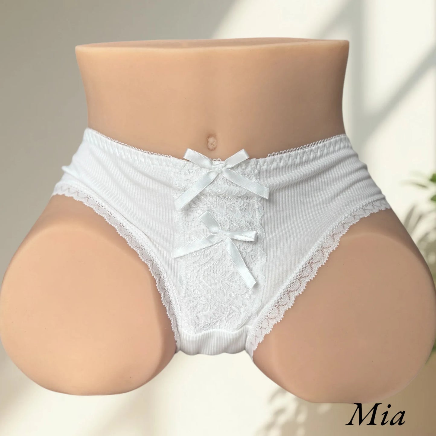 Mia wearing white lingerie ribbon panties front view