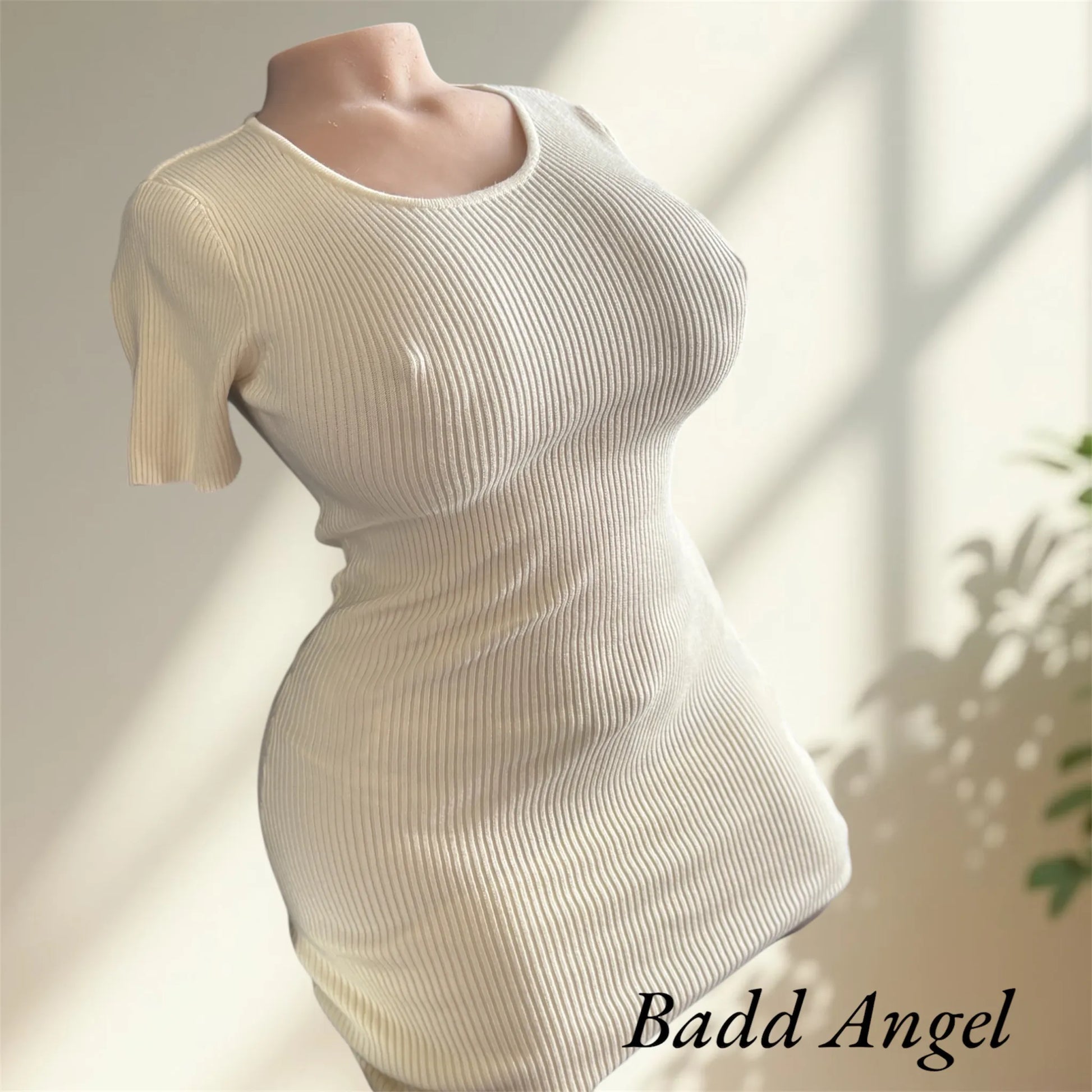 Badd Angel wearing a jennyfer dress